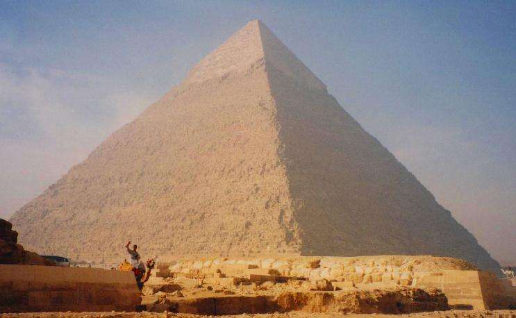 Camel Rides At The Pyramids Of Giza, Egypt. 