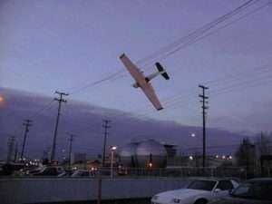 Plane in overhead powerlines