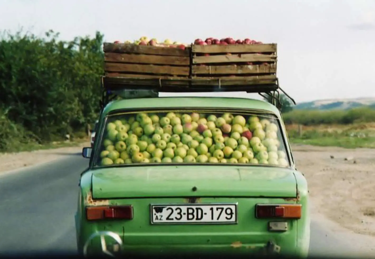 Car Overloaded With Apples