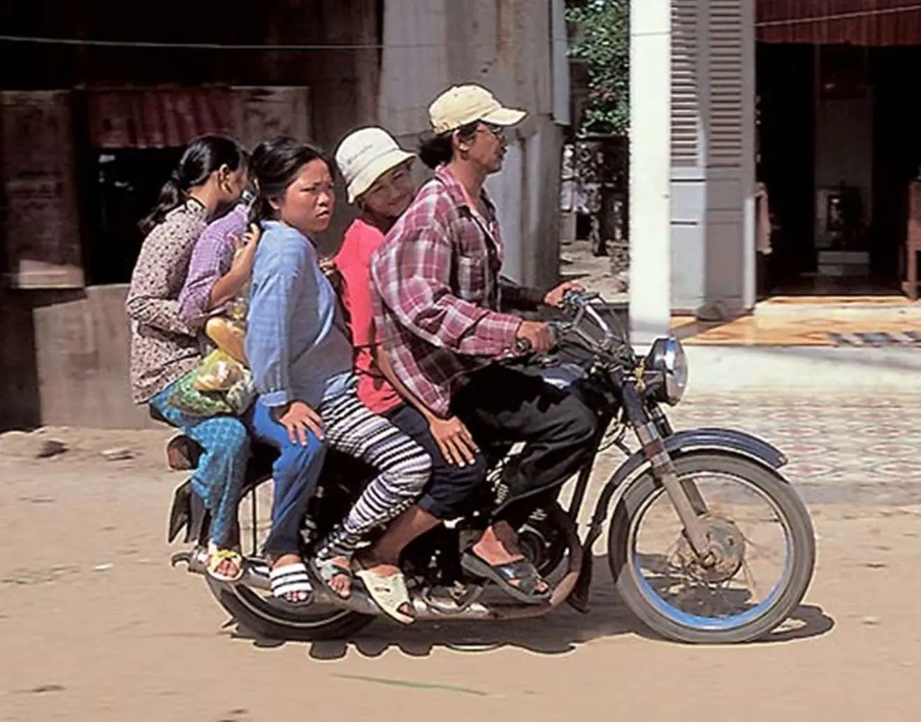 Transporting Family On Scooter