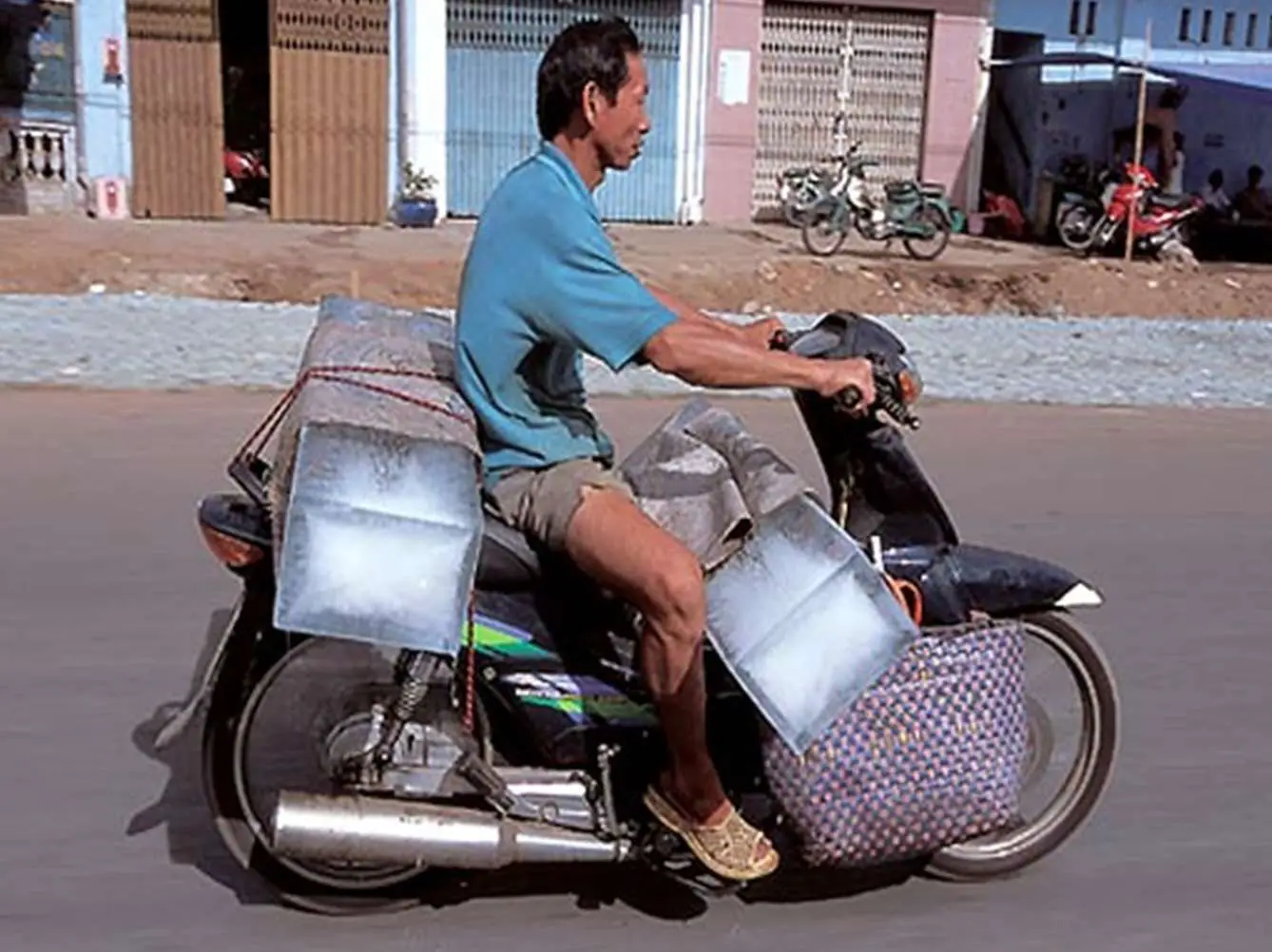 Transporting Ice By Scooter