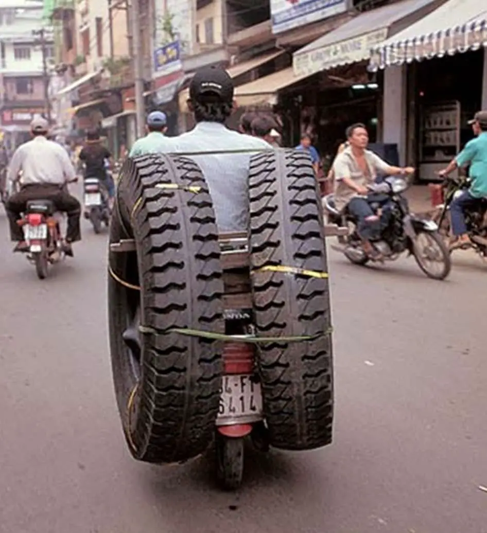 Truck Tyres Transport By Scooter