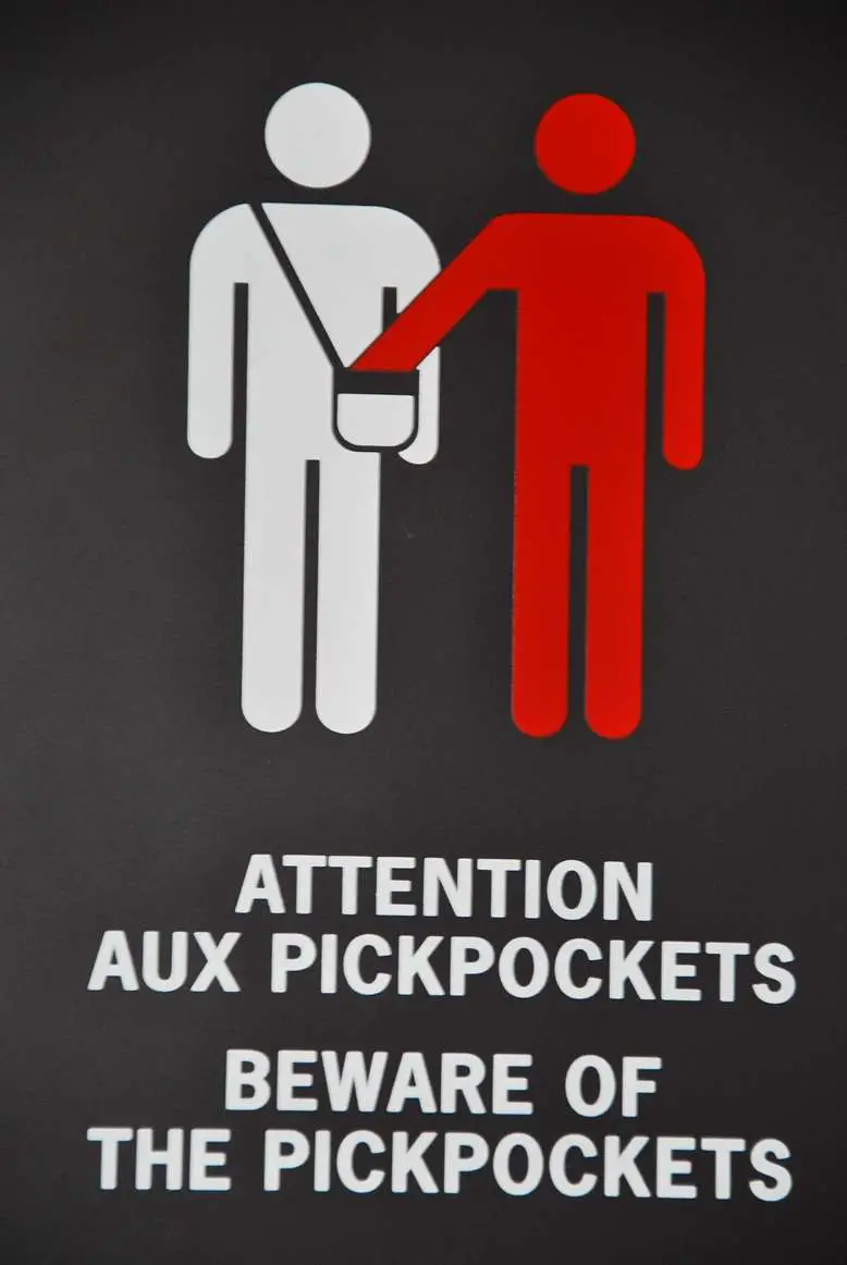 Pickpockets And Travel. Beware Of The Pickpockets Sign Eiffel Tower. Attention Aux Pickpockets