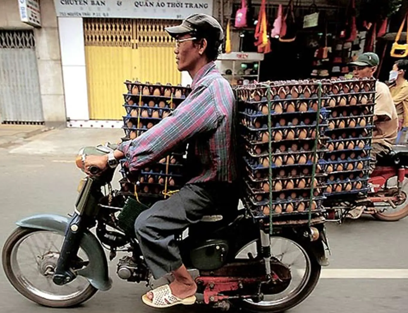 Transporting Eggs On Motor Scooter