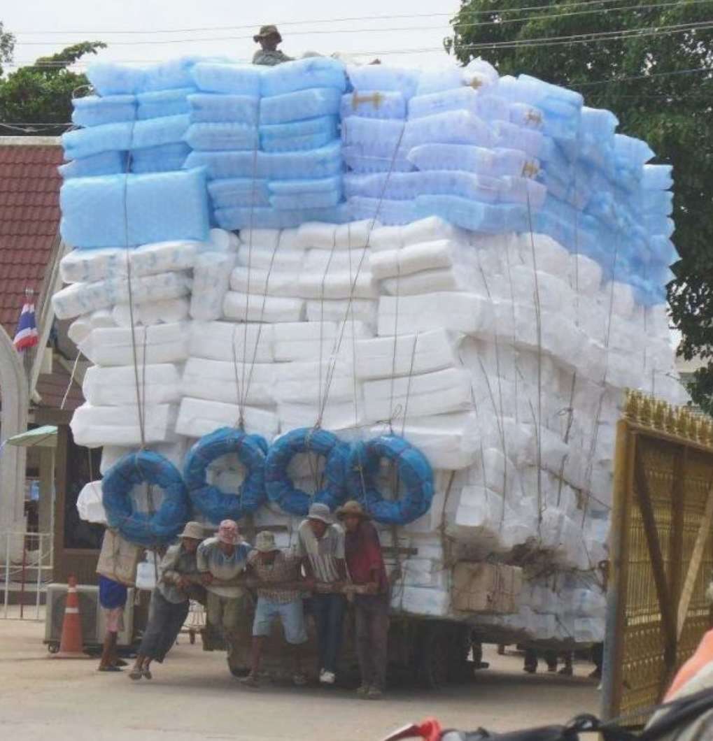 Transporting Plastic Bottles Manual Labour