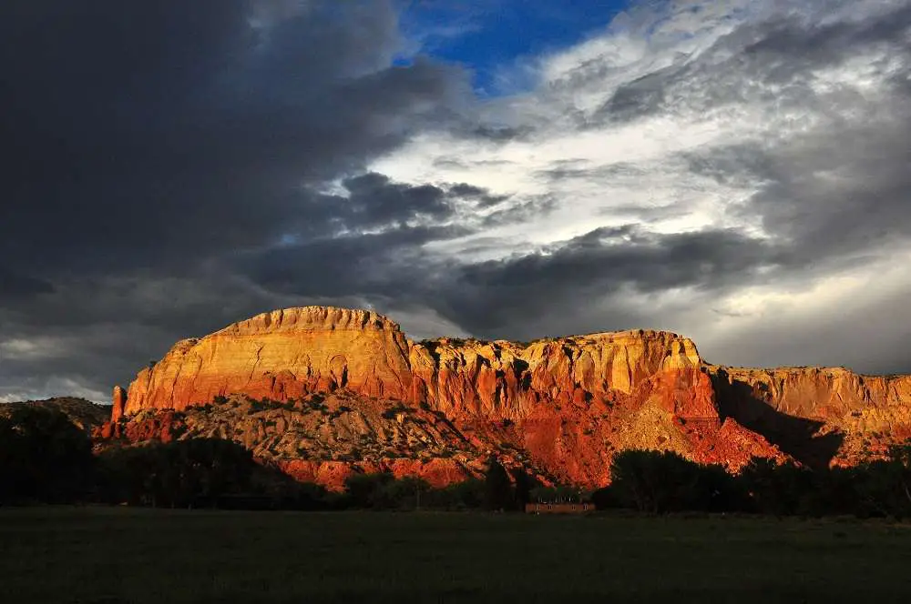 Ghost Ranch Redrock Cliffs Clouds | Halloween Ideas | Unusual Haunted Houses And Places To Visit This Halloween | Halloween Ideas | Author: Anthony Bianco - The Travel Tart Blog